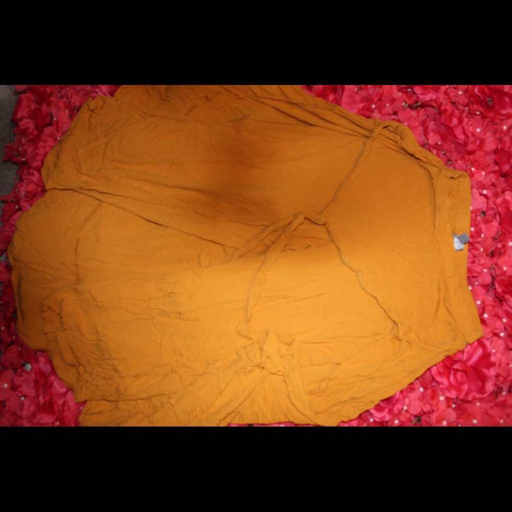 Capri in the front with a skirt accent